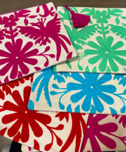Embroidered pouches for extras